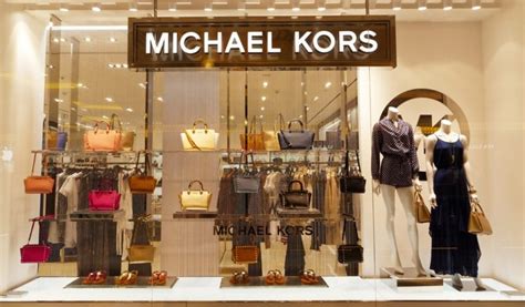 michael kors publicly traded|capri holdings limited brands.